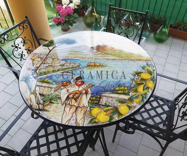 tavolo in pietra lavica deoro paesaggio costiera amalfitana