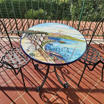 tavolo in pietra lavica tondo decorato con paesaggio